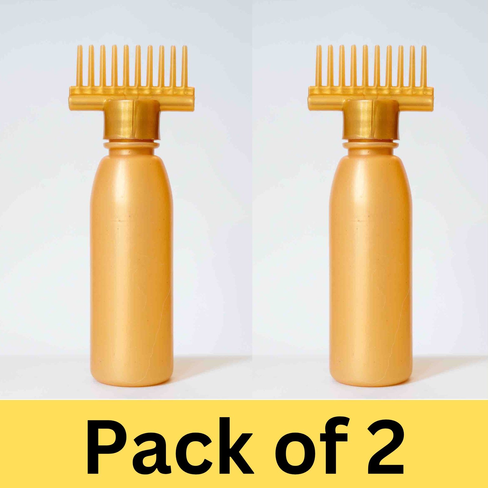 Hair oil bottle with comb